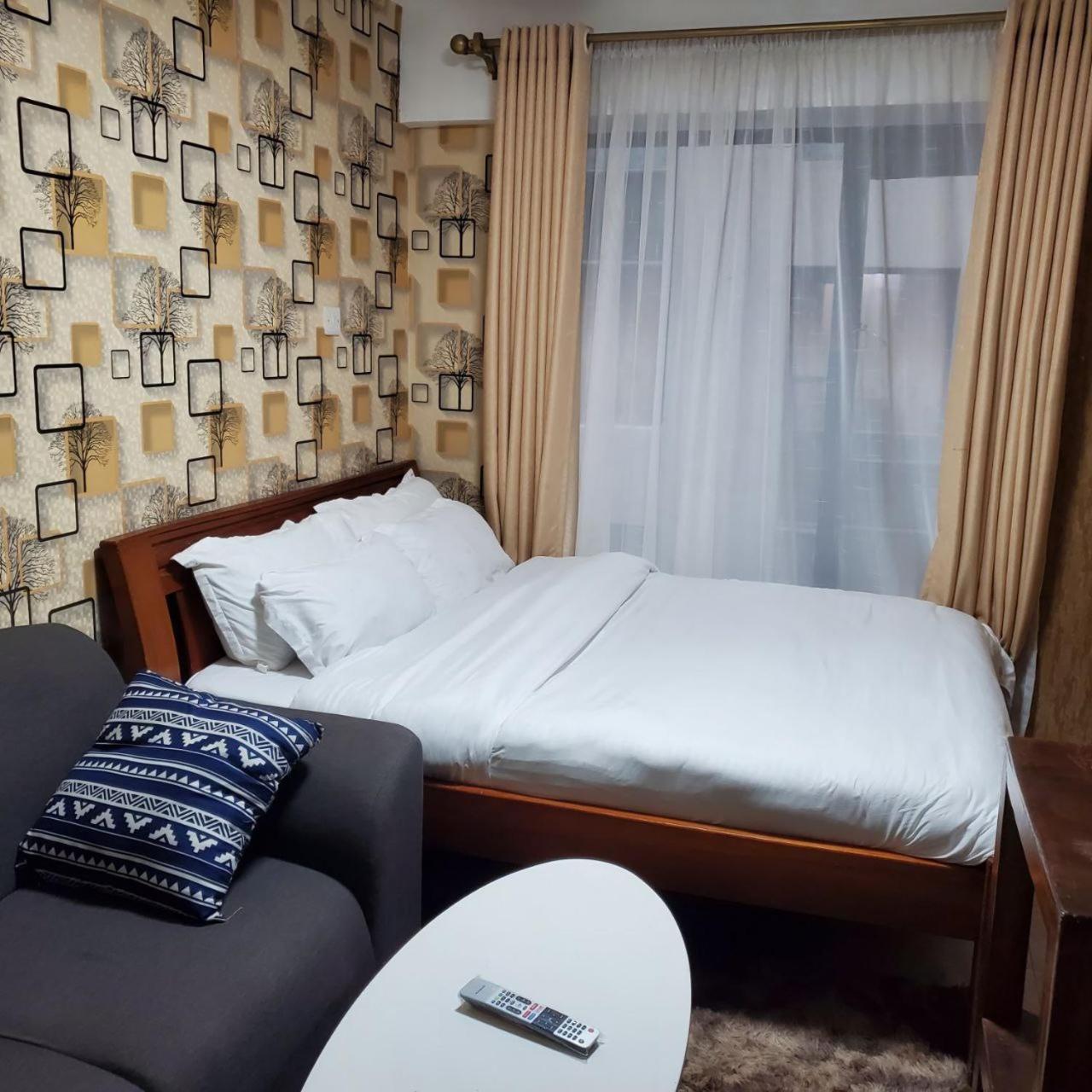 Апартаменты Lovely & Cozy Compact Studio Near Airport With Rooftop View Найроби Экстерьер фото