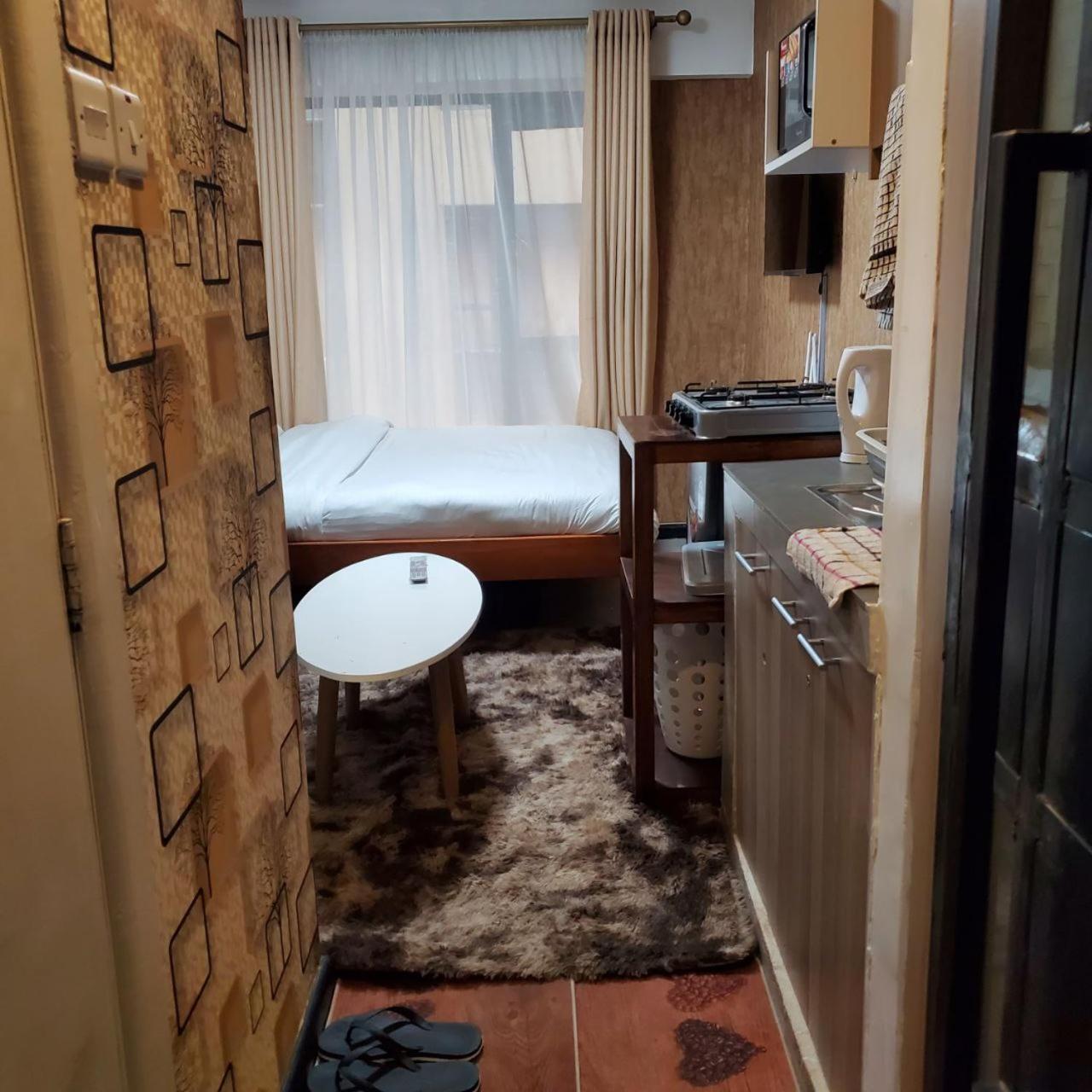 Апартаменты Lovely & Cozy Compact Studio Near Airport With Rooftop View Найроби Экстерьер фото