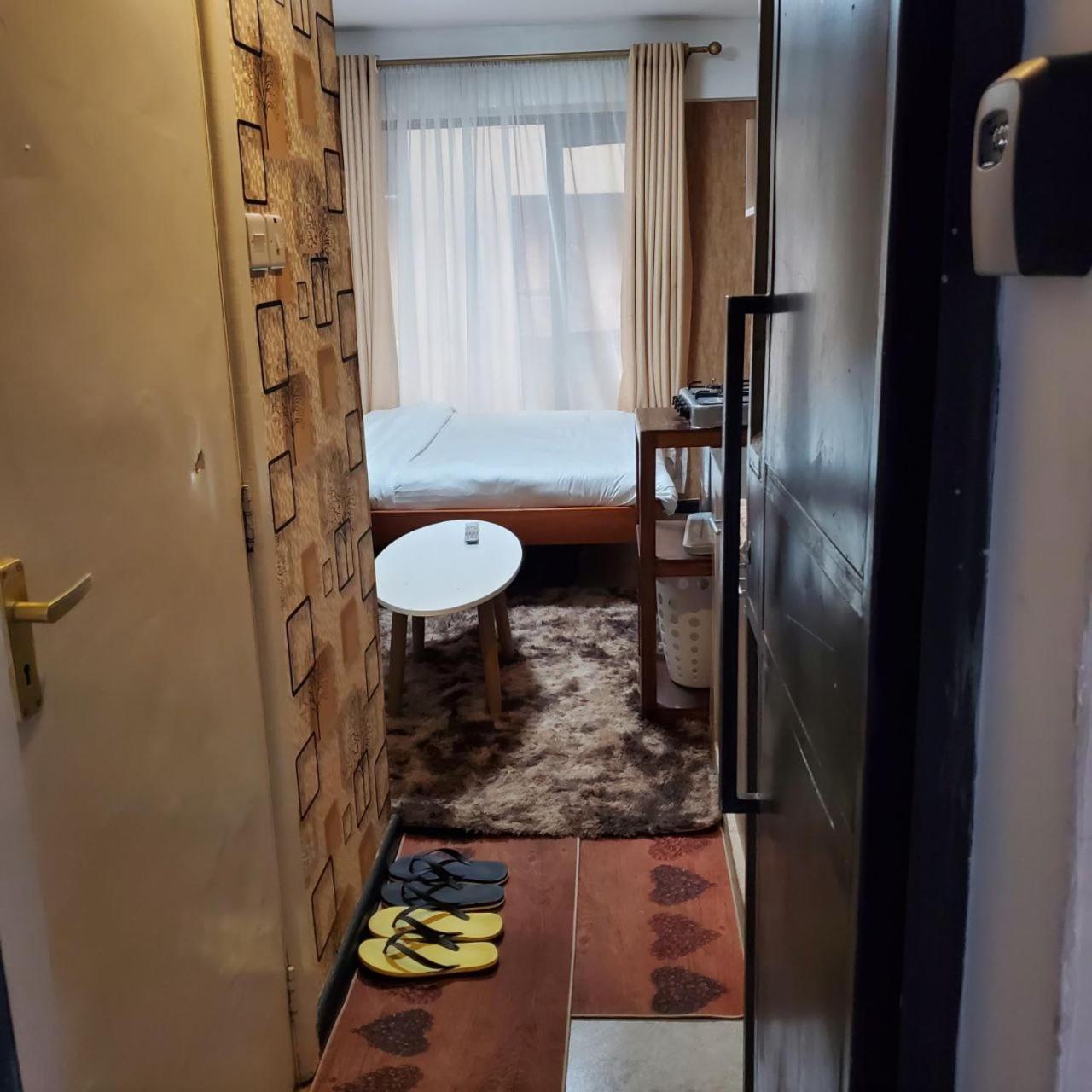 Апартаменты Lovely & Cozy Compact Studio Near Airport With Rooftop View Найроби Экстерьер фото