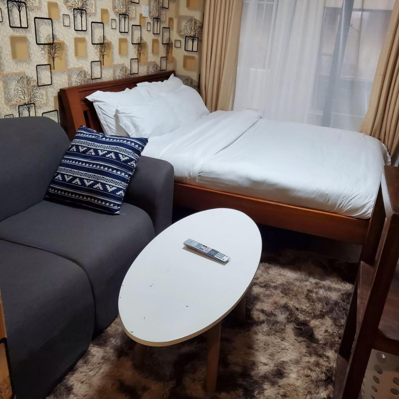 Апартаменты Lovely & Cozy Compact Studio Near Airport With Rooftop View Найроби Экстерьер фото