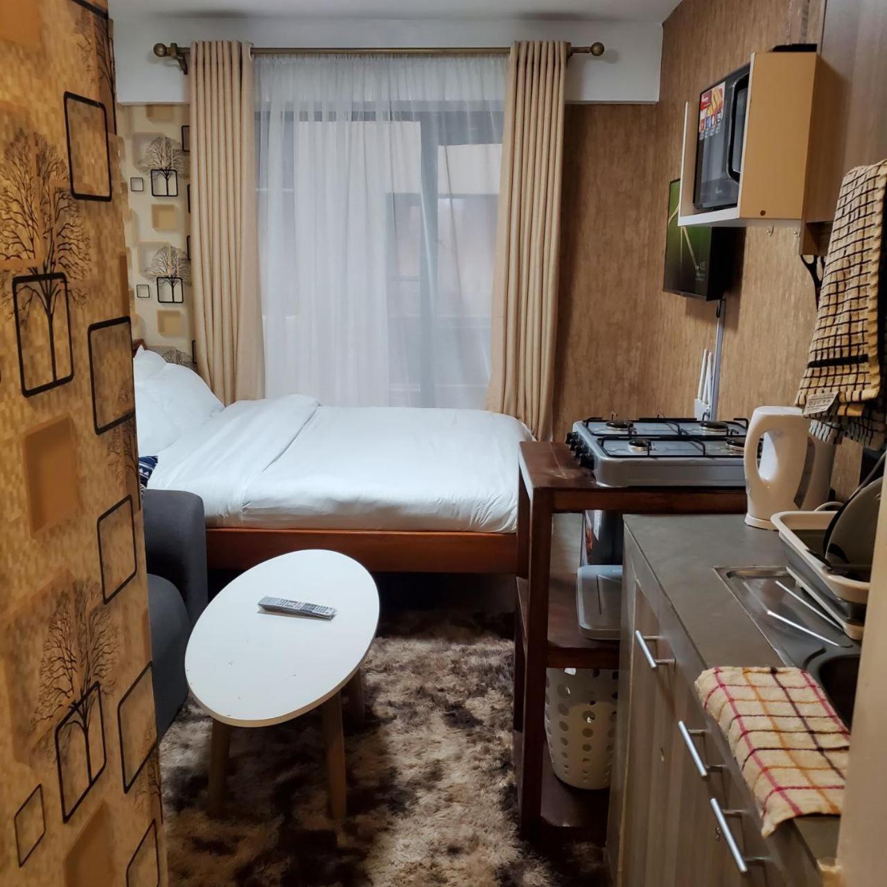 Апартаменты Lovely & Cozy Compact Studio Near Airport With Rooftop View Найроби Экстерьер фото